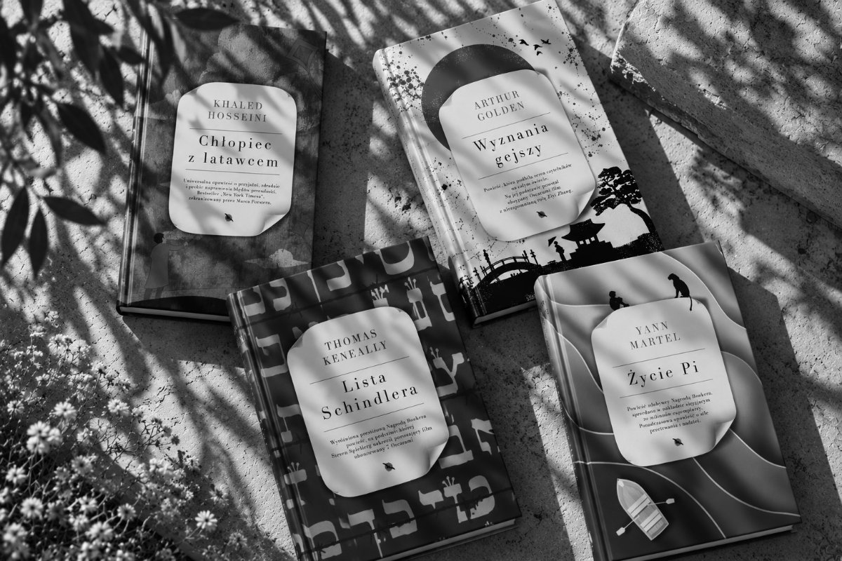 Original monochrome overhead still life of four books from Klasyki Albatrosa
