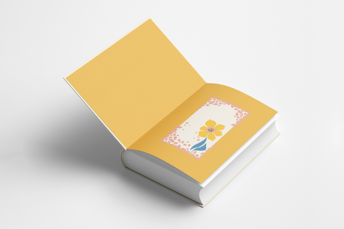 Open Życie Violette gift edition showing a warm yellow endpaper and blank dedication space with floral motif